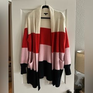 Long cardigan w/ pockets. Color blocking, red-pink-cream-black. Gently used